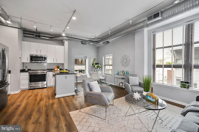 interior space with dark hardwood / wood-style floors