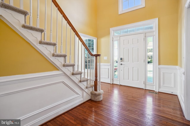 foyer entrance featuring hardwood / wood-style flooring