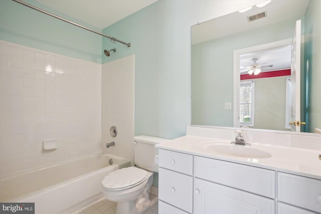 full bathroom featuring ceiling fan, tile patterned floors, shower / bath combination, toilet, and vanity