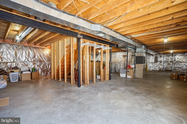 basement featuring heating unit