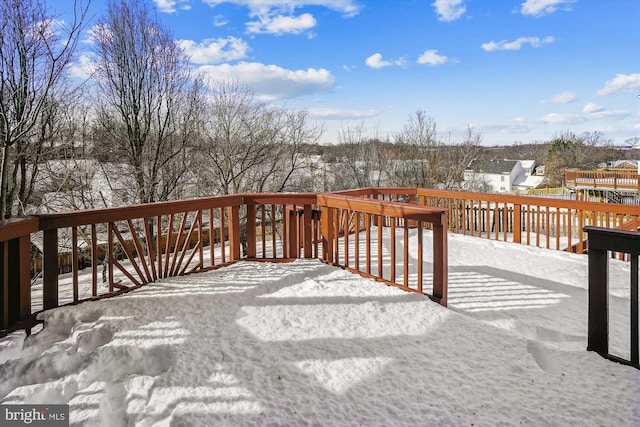 view of snow covered deck