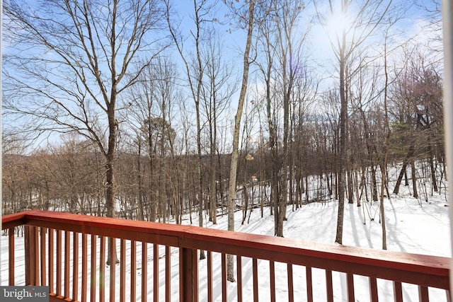 view of snow covered deck