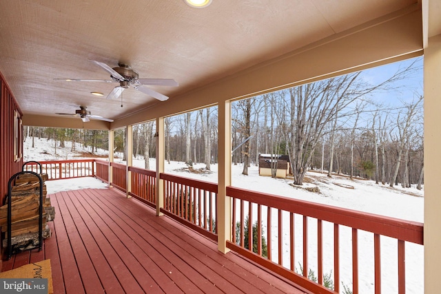 snow covered deck with ceiling fan