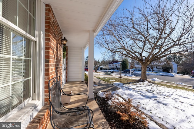 view of snow covered patio