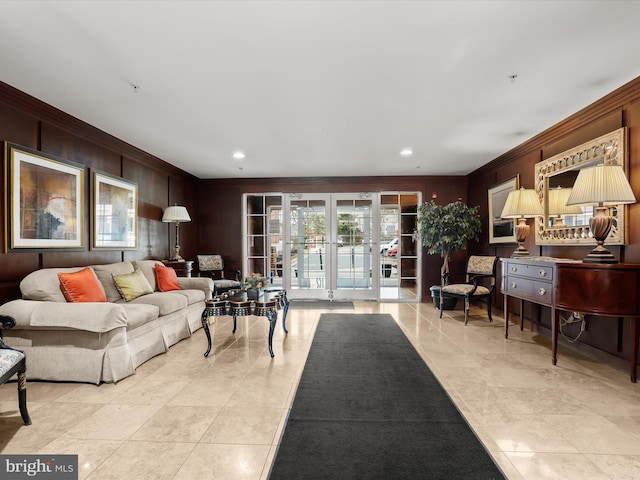 living area featuring crown molding, recessed lighting, and french doors