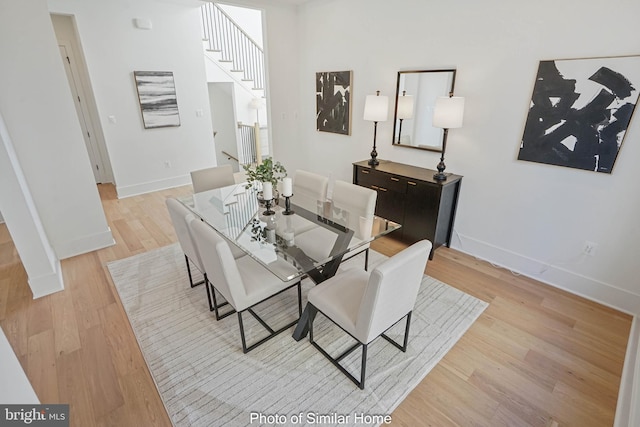 dining room featuring light hardwood / wood-style flooring