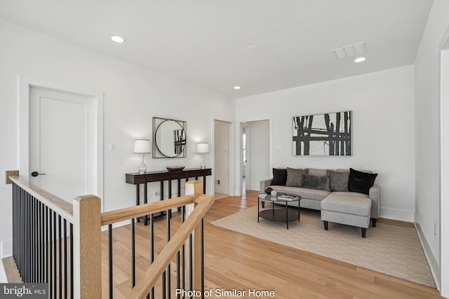 living room with hardwood / wood-style floors