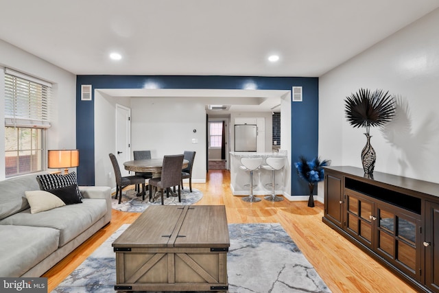 living room with light wood-type flooring