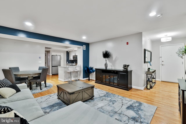 living room featuring light hardwood / wood-style floors