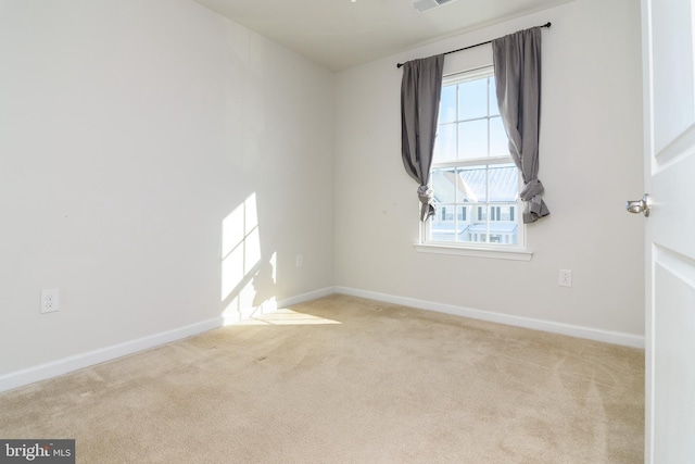 view of carpeted spare room