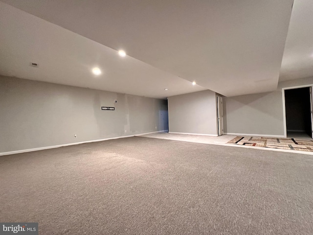 basement with carpet flooring