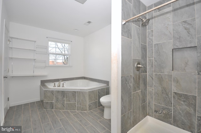 bathroom with toilet and shower with separate bathtub