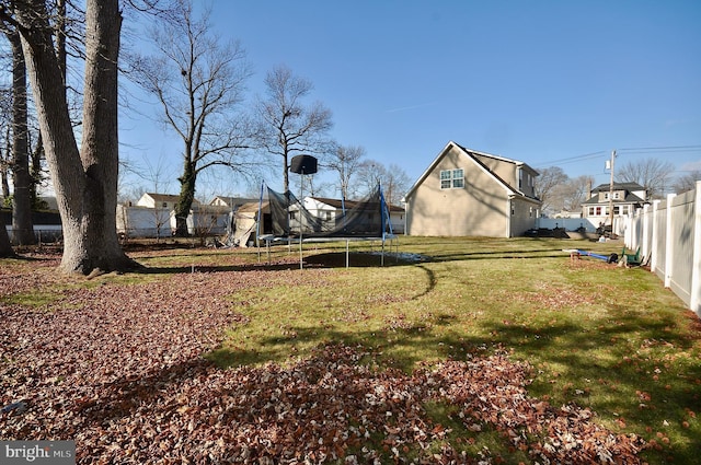 view of yard with a trampoline