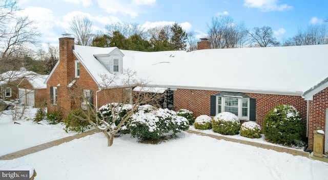 view of snow covered property