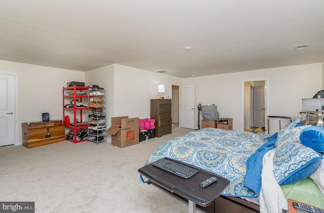 carpeted bedroom with visible vents