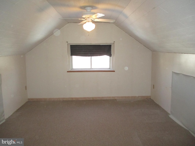 bonus room with ceiling fan, vaulted ceiling, and carpet floors