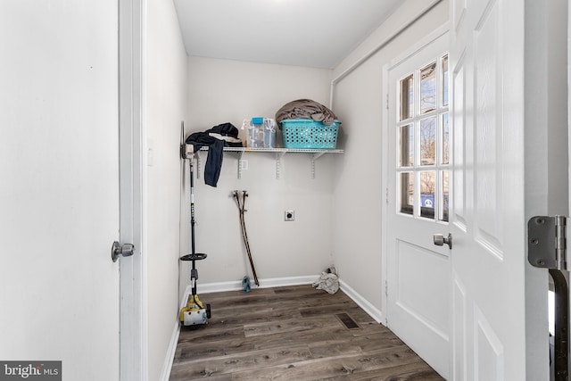 clothes washing area with hookup for a washing machine, wood-type flooring, and hookup for an electric dryer