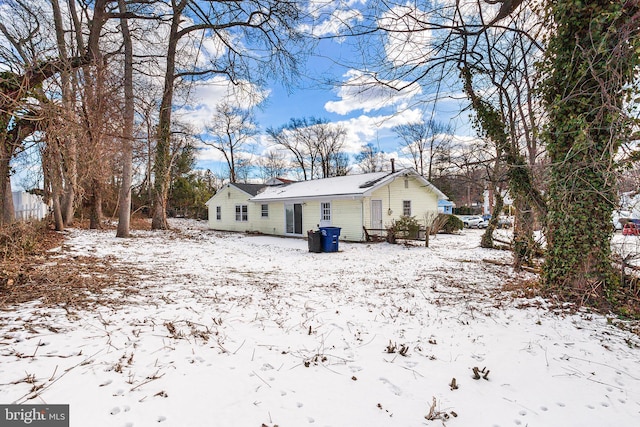 view of snow covered house