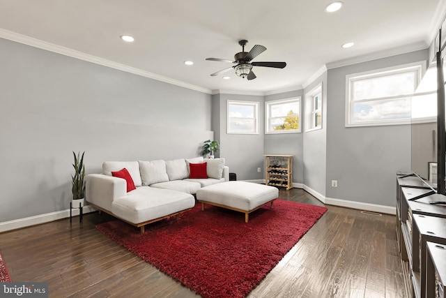 living room featuring crown molding, dark hardwood / wood-style floors, and ceiling fan