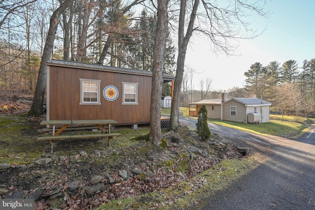 exterior space with an outbuilding