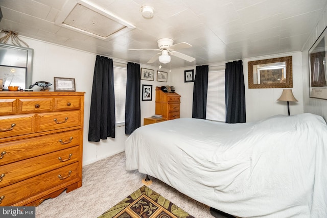 bedroom with ceiling fan and carpet flooring