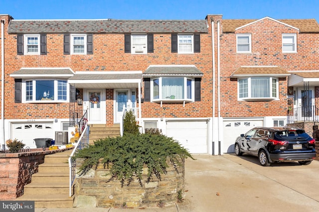 3402 Orion Rd, Philadelphia, PA 19154 - view of property featuring central air condition unit and a garage