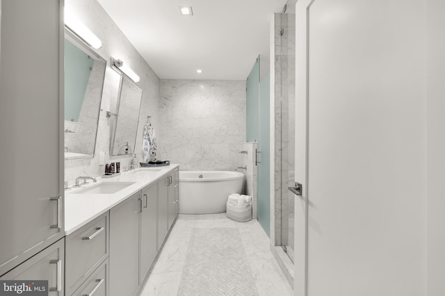 8551 Connecticut Ave Unit 210, Chevy Chase, MD 20815 - bathroom with separate shower and tub, vanity, and tile walls