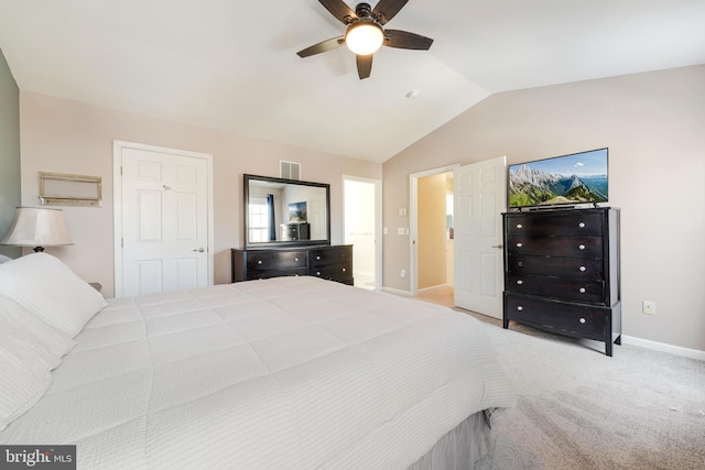 carpeted bedroom featuring vaulted ceiling and ceiling fan