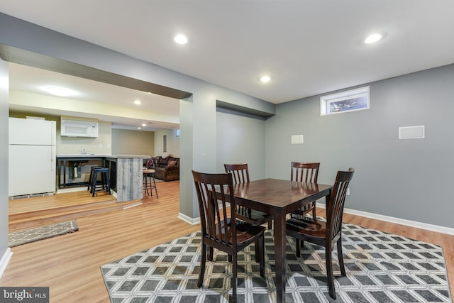 dining area featuring light hardwood / wood-style floors