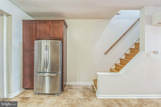 kitchen featuring stainless steel refrigerator