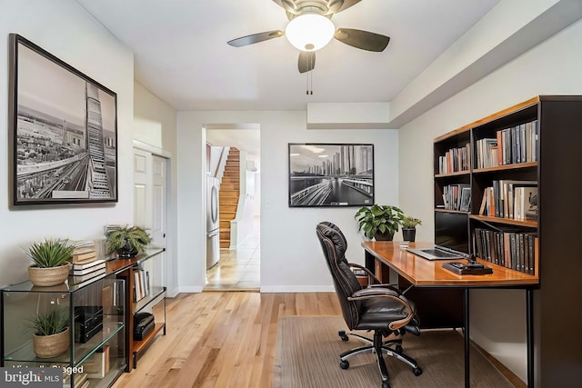 office featuring light hardwood / wood-style flooring and ceiling fan