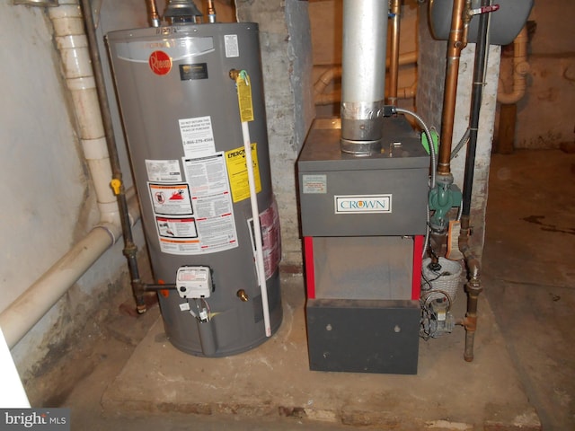 utility room featuring gas water heater