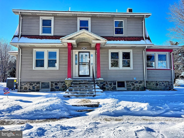 view of front of home featuring central AC unit