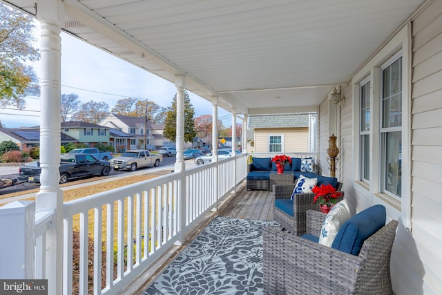 wooden terrace with covered porch