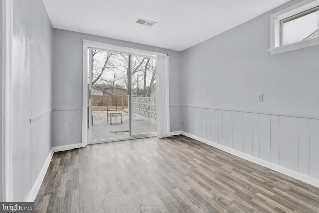 empty room featuring hardwood / wood-style flooring