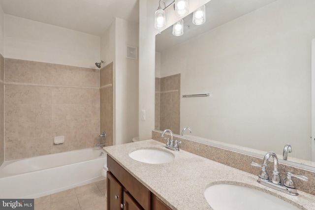 full bathroom with toilet, vanity, shower / bath combination, and tile patterned floors