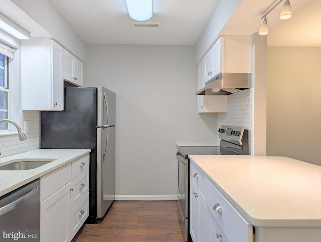 kitchen featuring white cabinets, sink, and stainless steel appliances