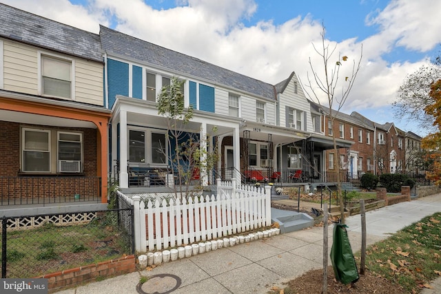 view of property featuring a porch