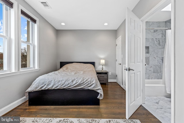 bedroom featuring dark wood-type flooring