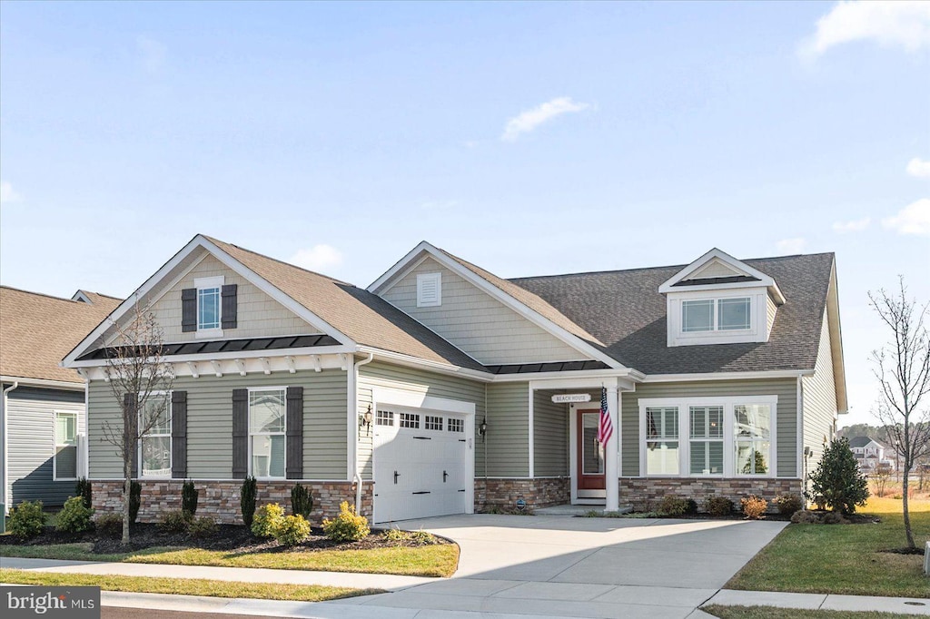 craftsman-style home with a garage