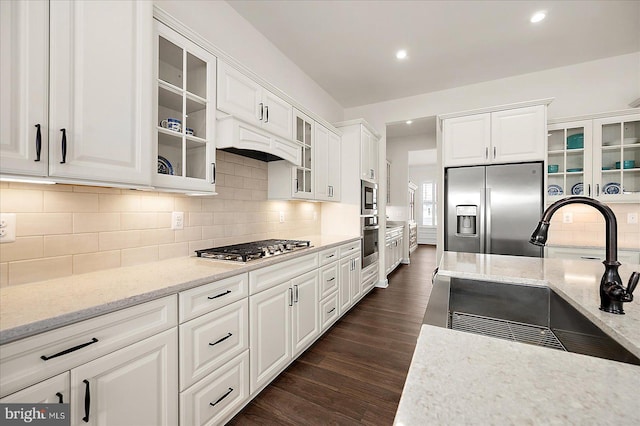 kitchen featuring white cabinetry, appliances with stainless steel finishes, and sink