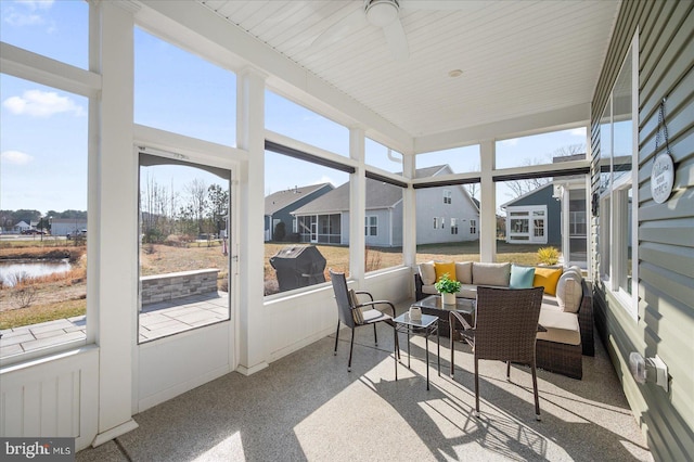 sunroom / solarium with ceiling fan