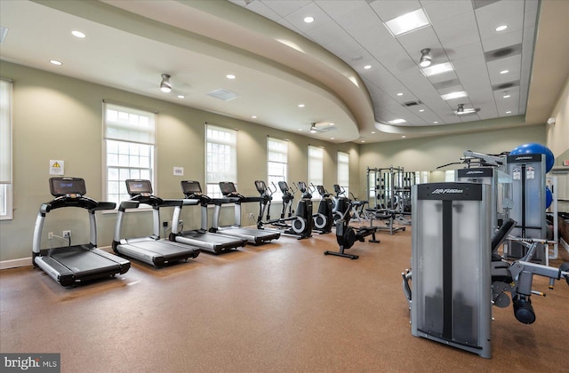 workout area with a paneled ceiling