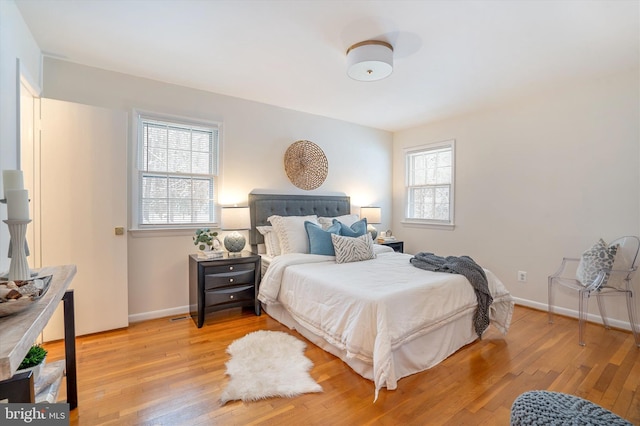 bedroom with light wood-type flooring