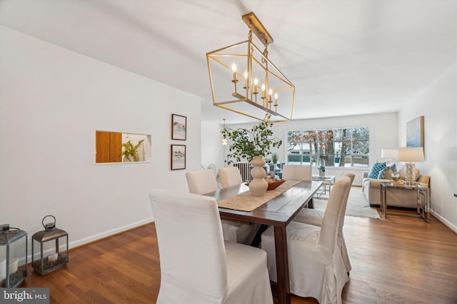 dining space featuring dark hardwood / wood-style floors