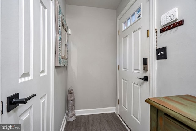 doorway to outside featuring dark hardwood / wood-style floors