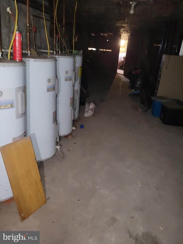 utilities featuring gas water heater and electric water heater