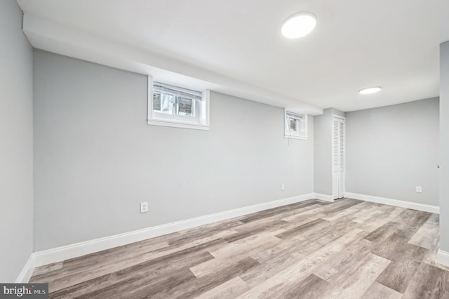 basement featuring light hardwood / wood-style flooring