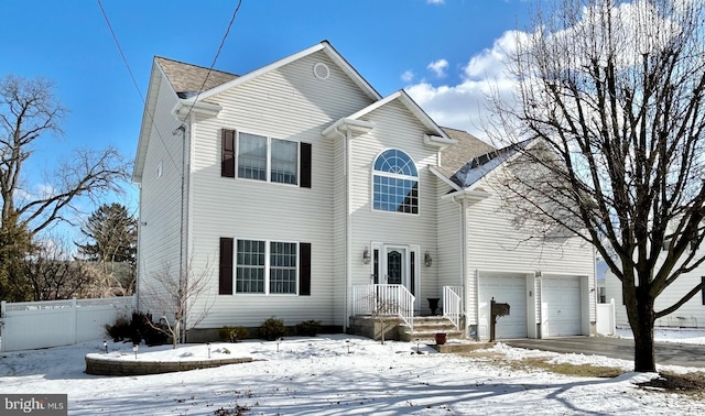 front of property featuring a garage