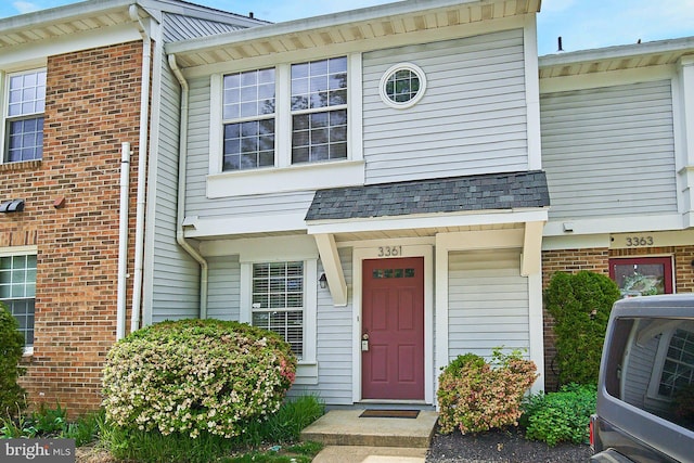 property entrance featuring ac unit